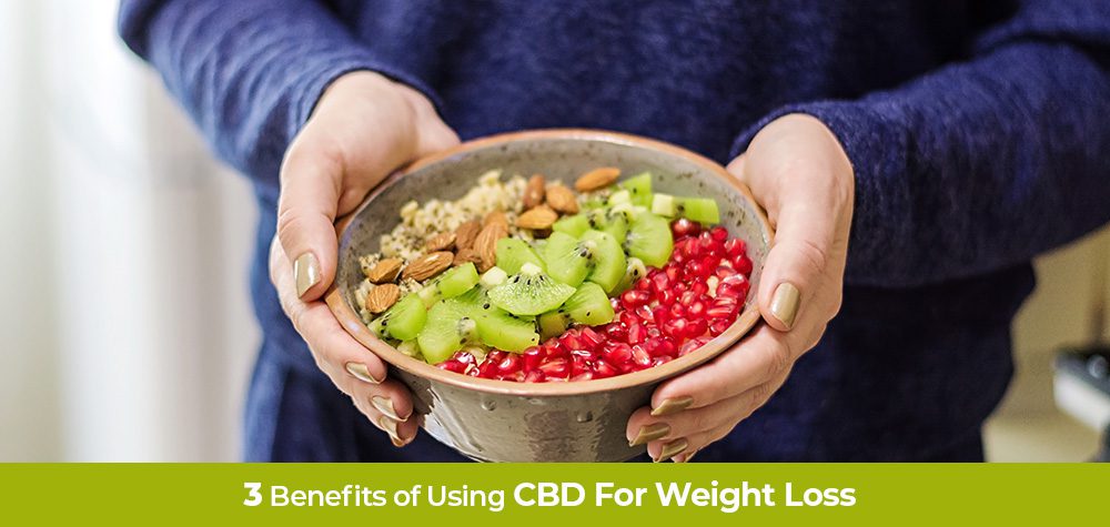 Mom Holding Healthy fruit and granola cereal. Three benefits of using CBD for weight loss management.